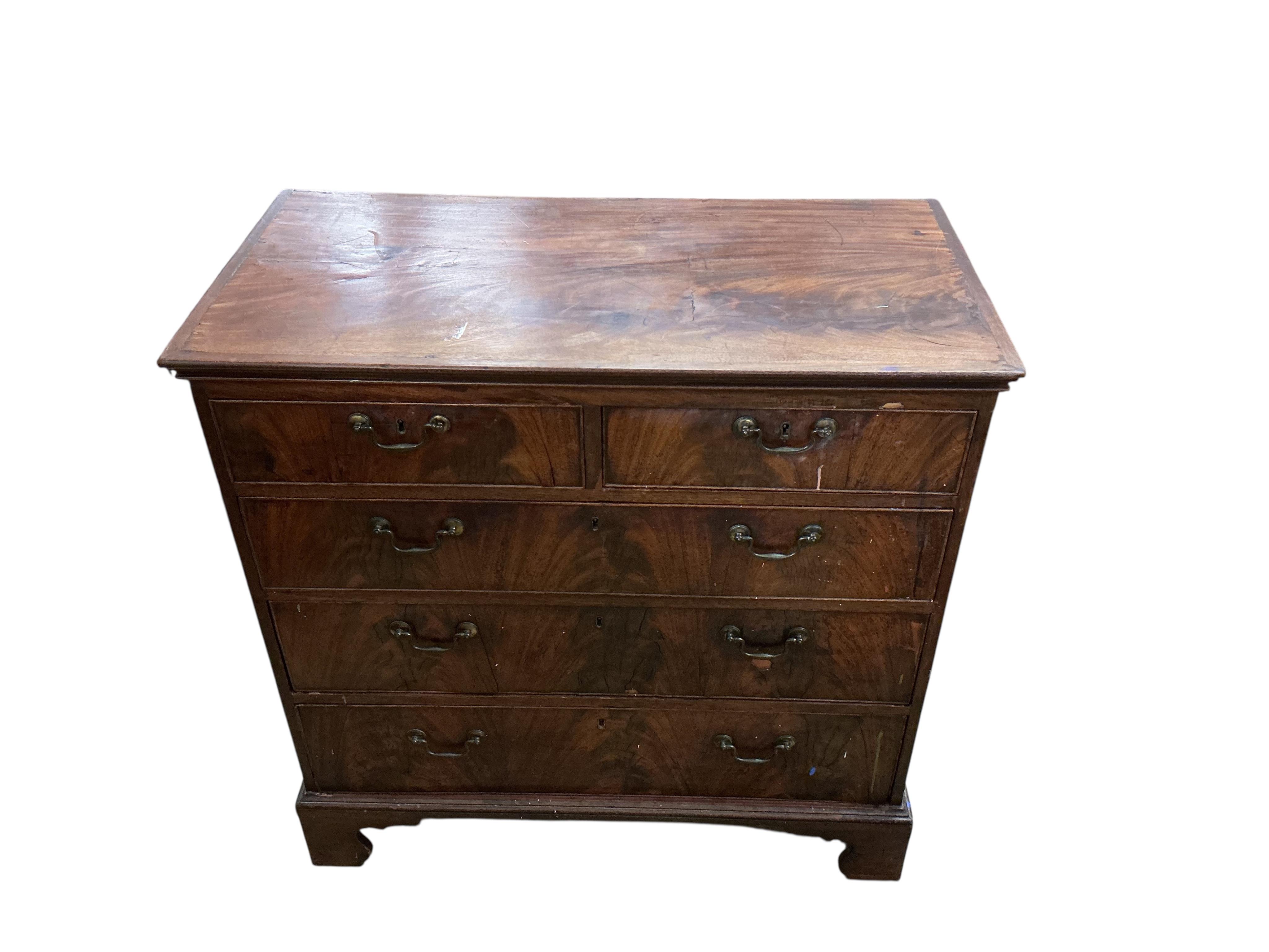 A George III mahogany chest of four long drawers, on bracket feet, width 95cm, depth 49cm, height 94cm